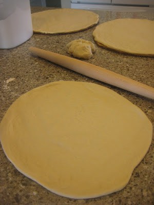 Dough rolled out on the countertop.