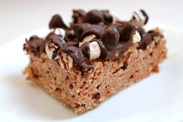 A single Nutella rice Krispie is sitting on a white plate.