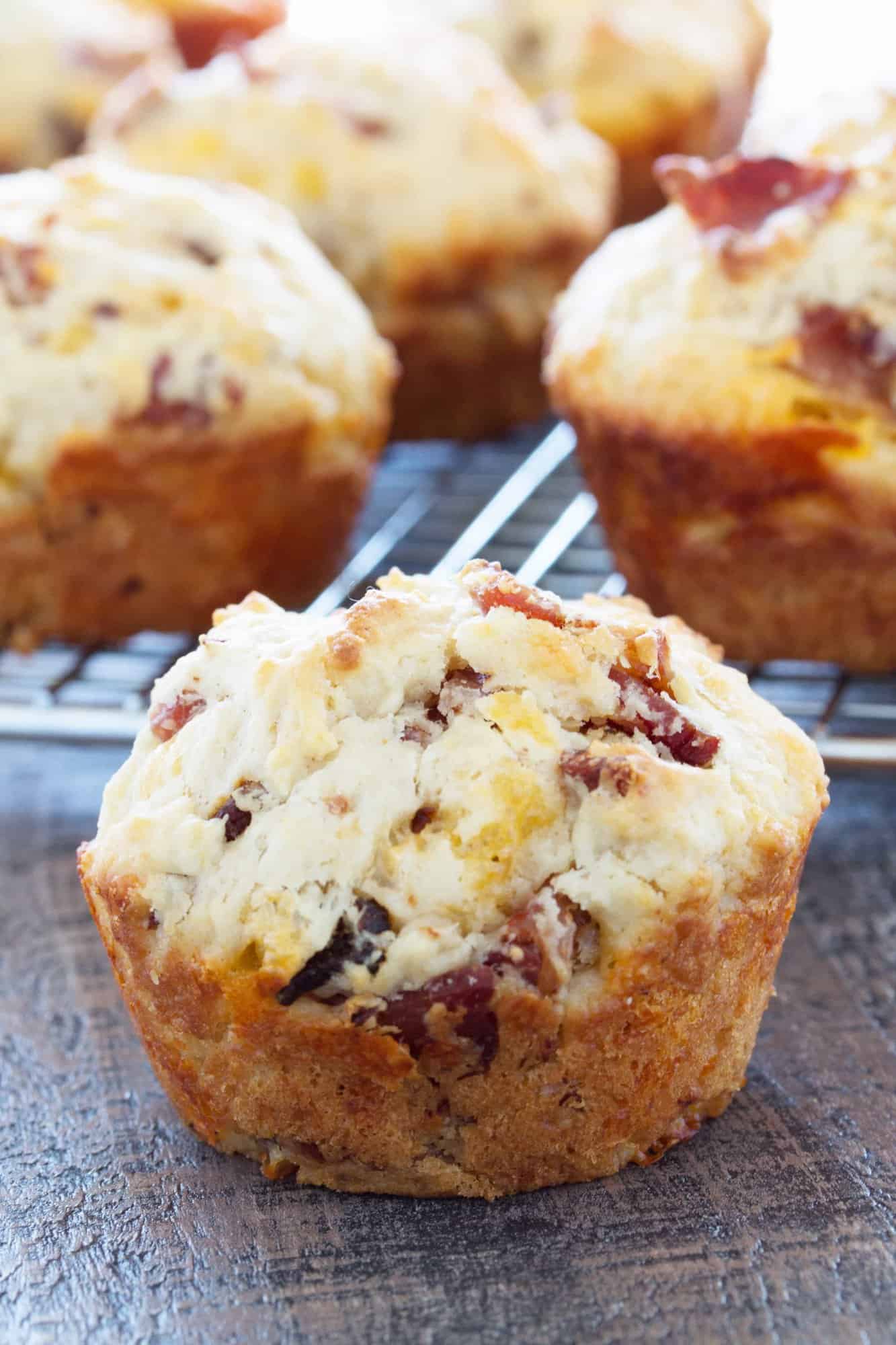 Savory Bacon Cheddar Muffins are the perfect on-the-go breakfast item. It’s a hearty, moist, and deliciously savory muffin that you’ll be happy to wake up to every day!