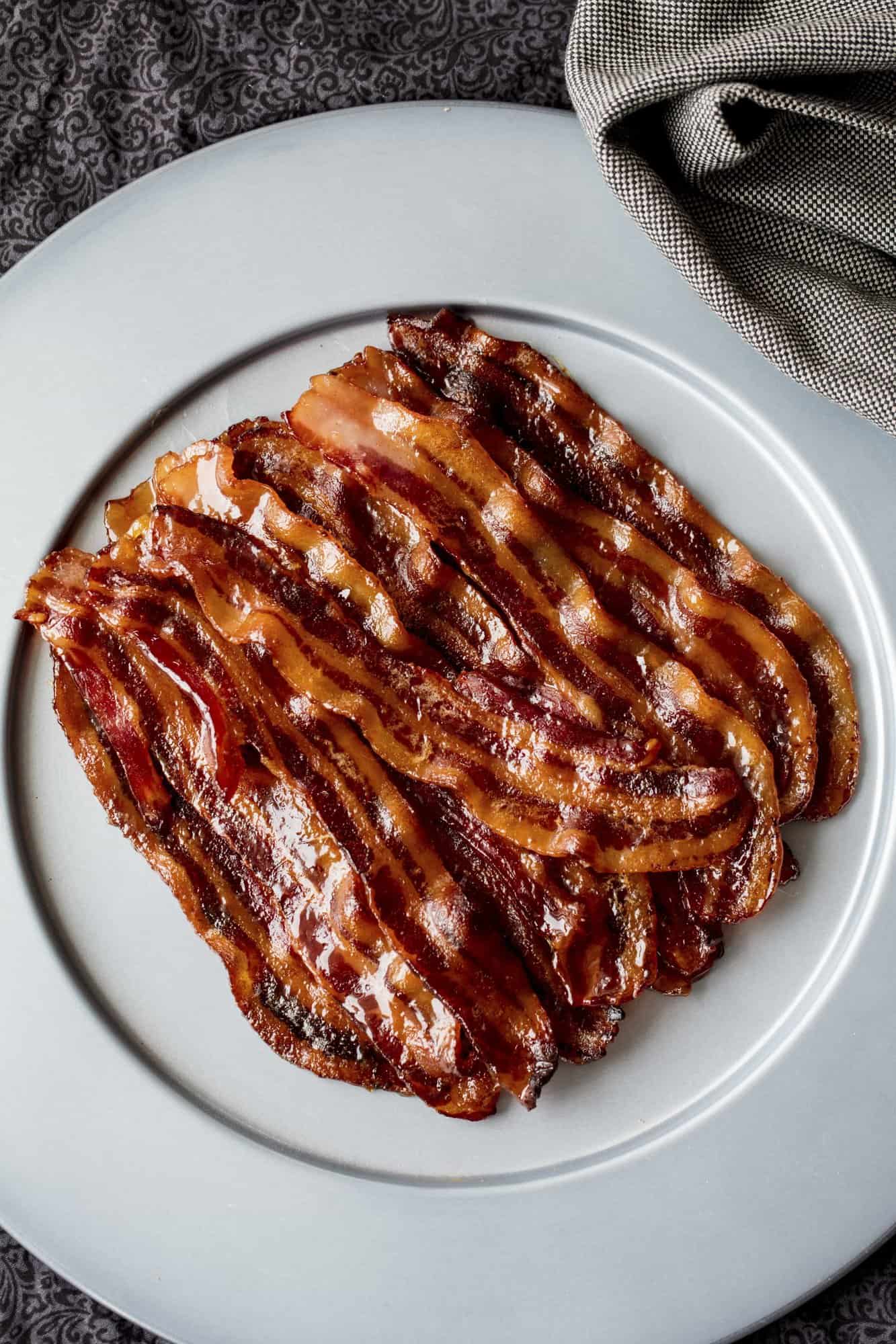 This Spicy Maple Candied Bacon takes glorious bacon and makes it even better Spicy Maple Candied Bacon