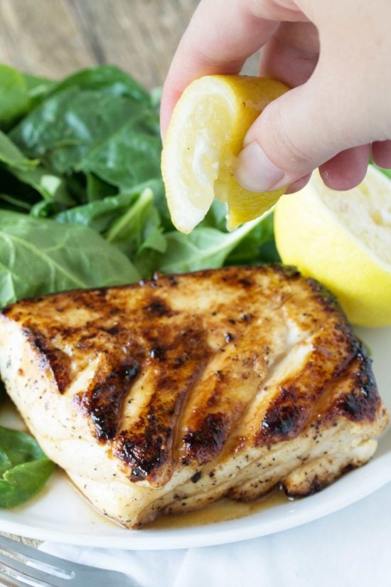  Easy and delicious grilled halibut recipe with honey and lemon will have you falling in l Grilled Halibut