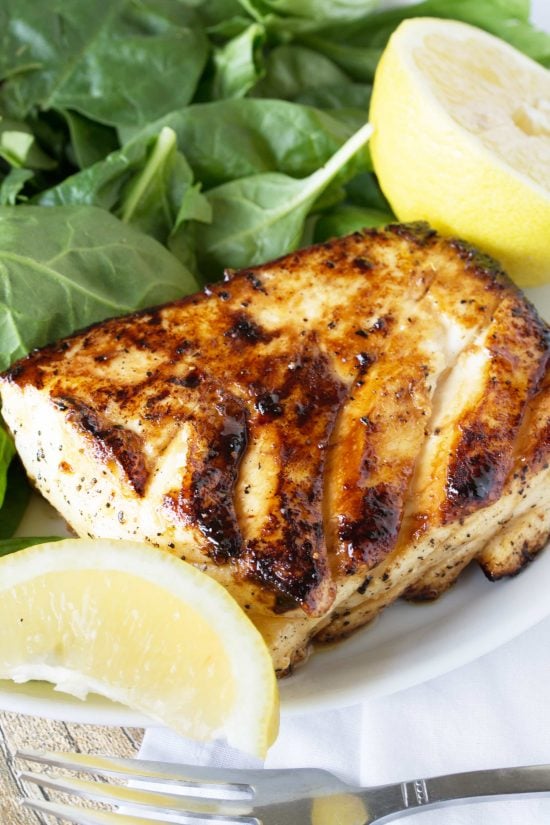 Easy and delicious grilled halibut recipe with honey and lemon will have you falling in l Grilled Halibut