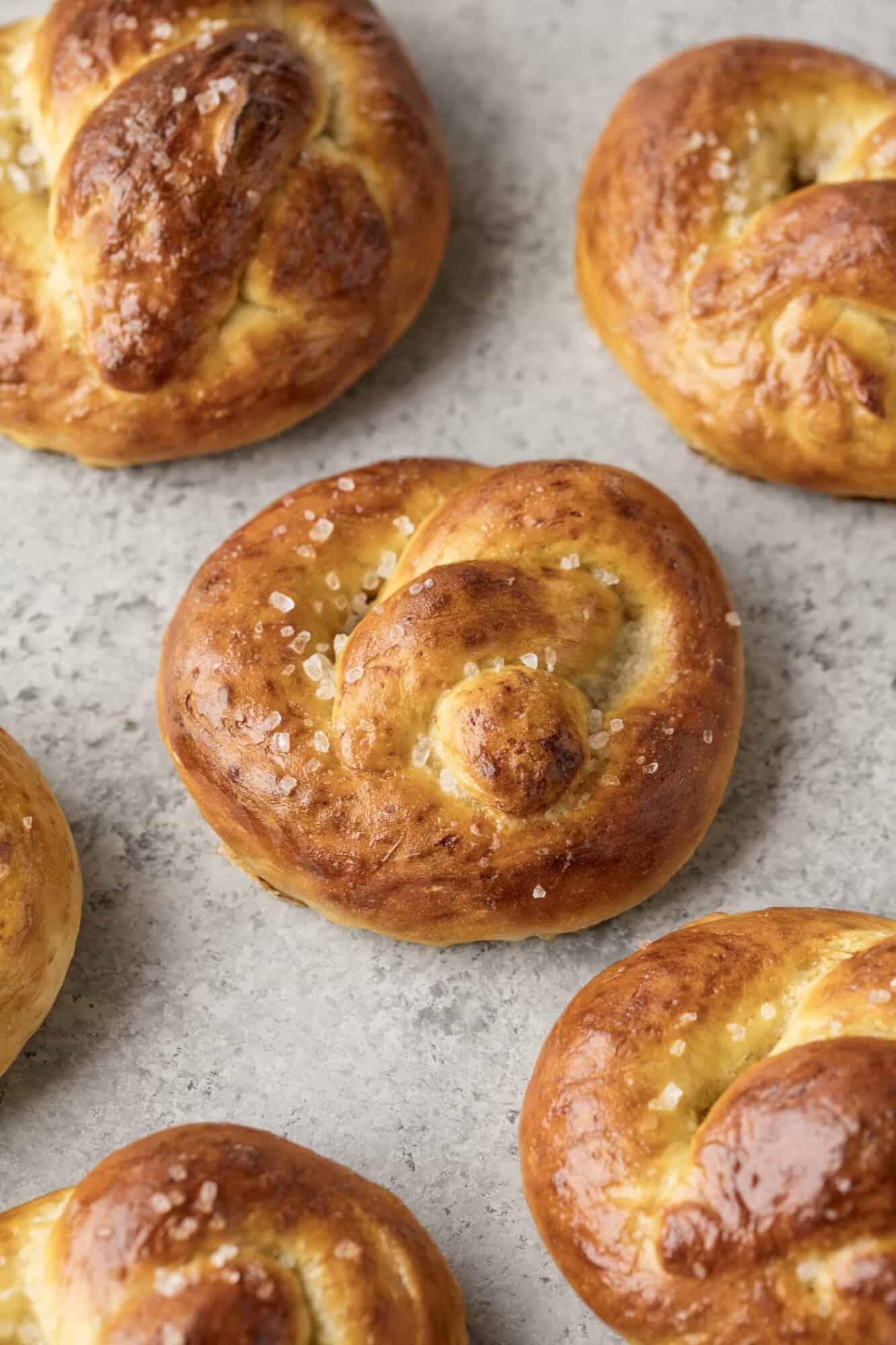 Learn how to make The Best Homemade Soft Pretzels complete with a visual demonstration. Just a few simple ingredients is all you need and it's so easy the kids can get in on the action too!