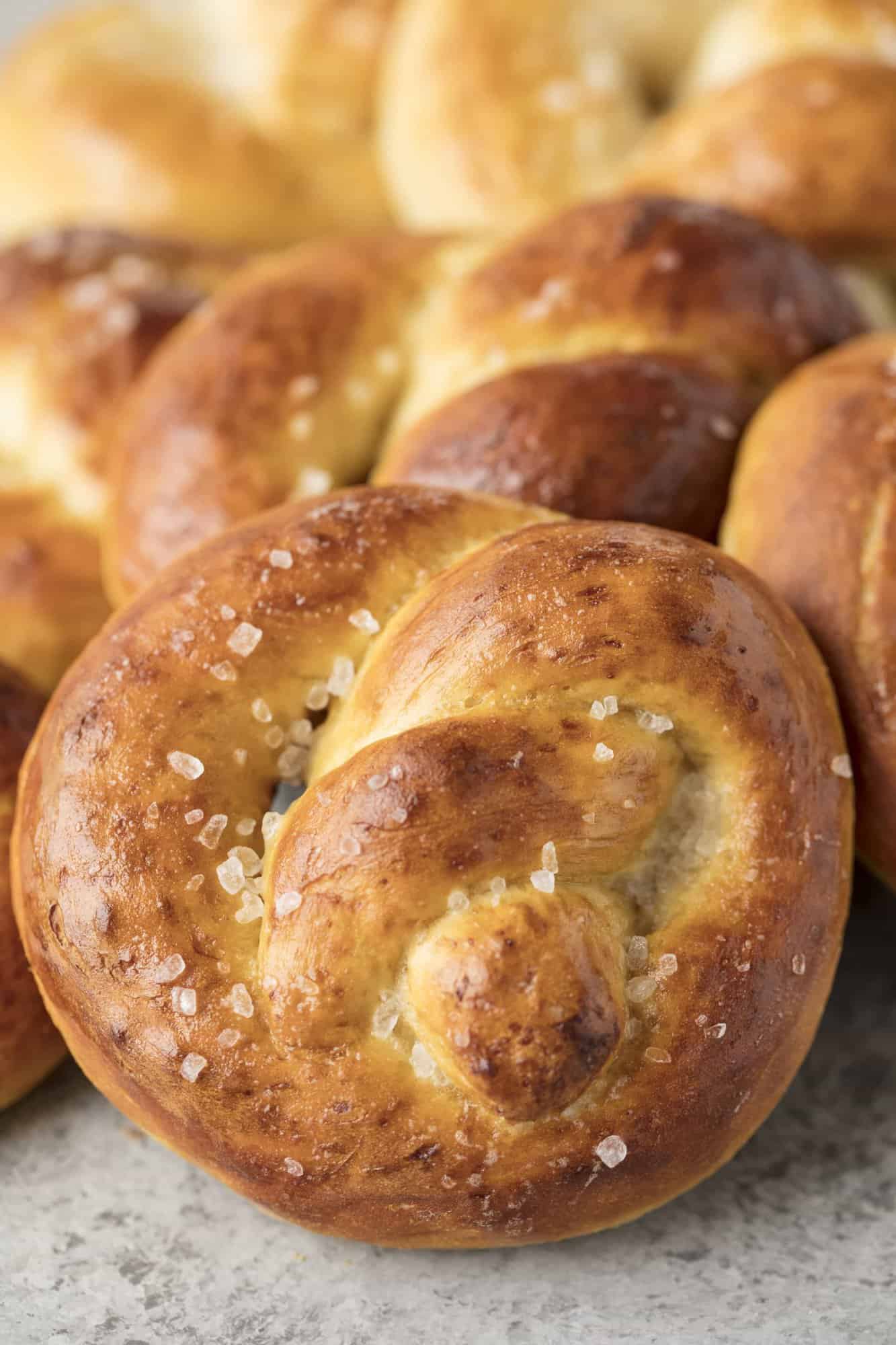 Learn how to make The Best Homemade Soft Pretzels complete with a visual demonstration. Just a few simple ingredients is all you need and it's so easy the kids can get in on the action too!
