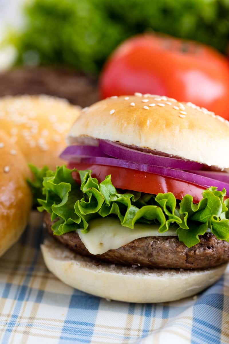 Homemade Hamburger Buns are easy to make and will take your burgers over the top Homemade Hamburger Buns