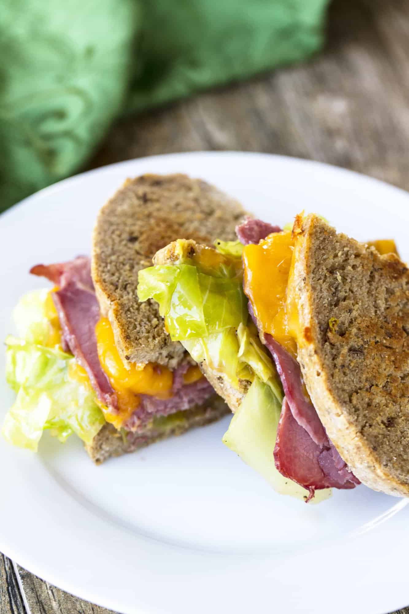 This Corned Beef and Cabbage Grilled Cheese Sandwich is the perfect way to use up St. Patrick's Day leftovers. Or better yet, use it as a simple way to celebrate with this favorite Irish-American holiday tradition!