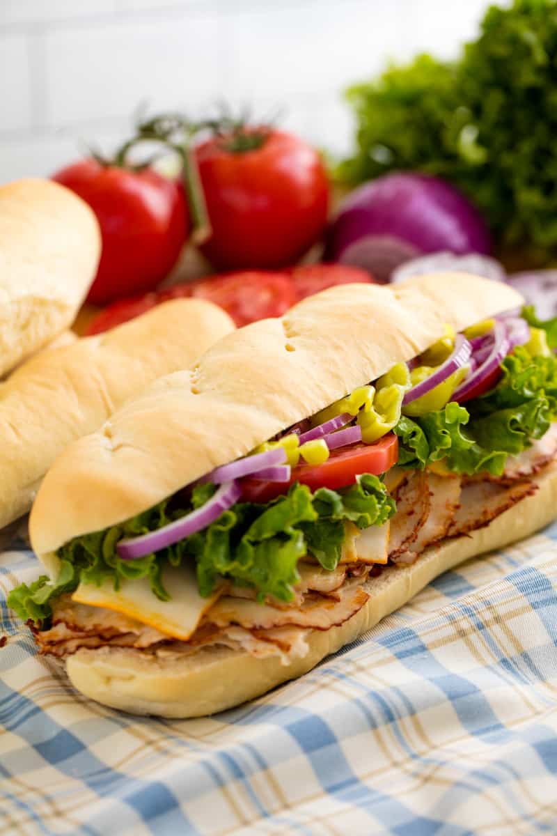 Hoagie Sandwich on a table cloth.