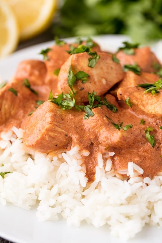 Chicken Tikka Masala on rice sprinkled with cilantro