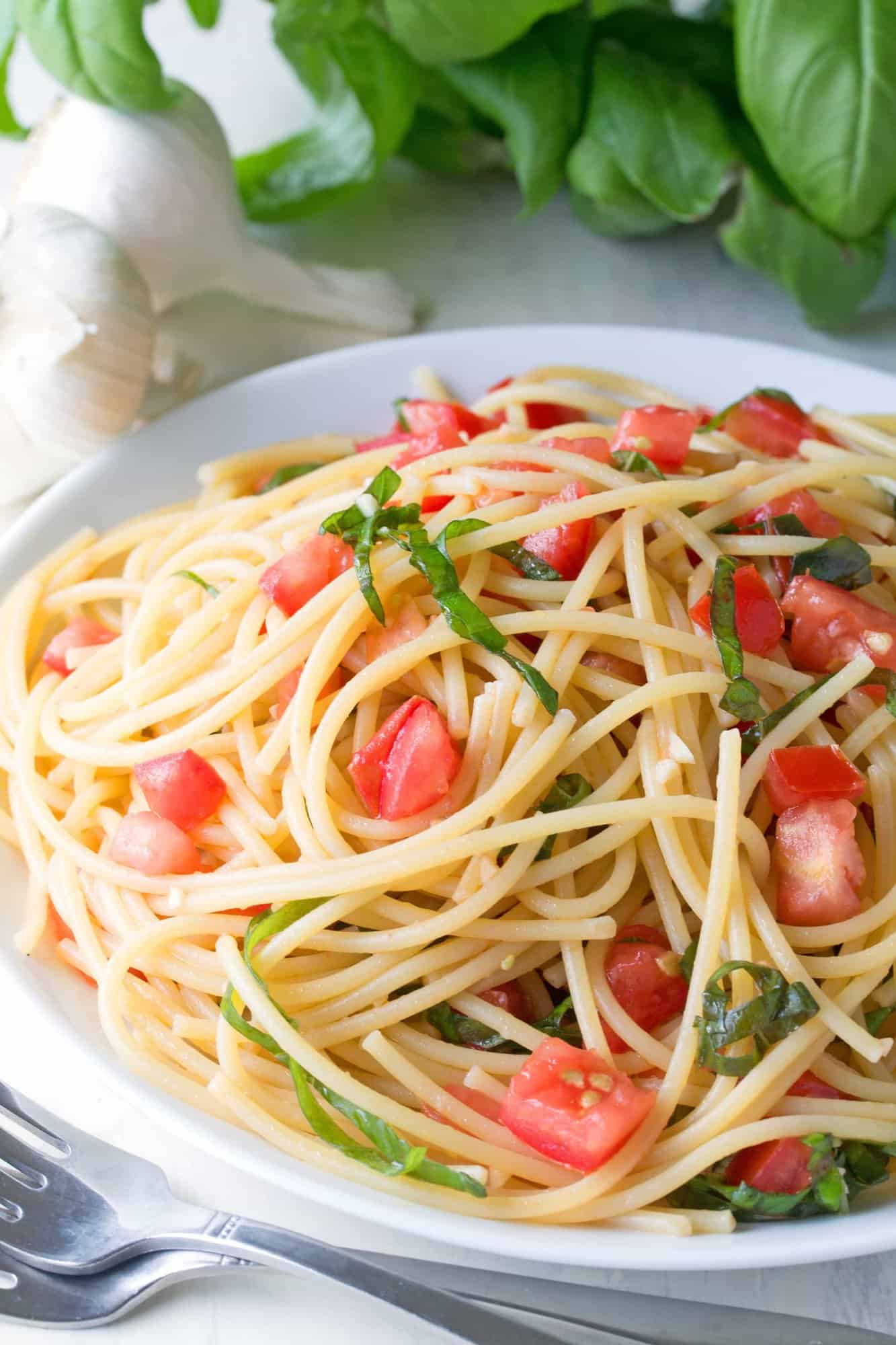 This fresh summer pasta can be eaten hot or cold and comes together in just minutes. It's 15 Minute Summer Garden Pasta and it's amazingly delicious!