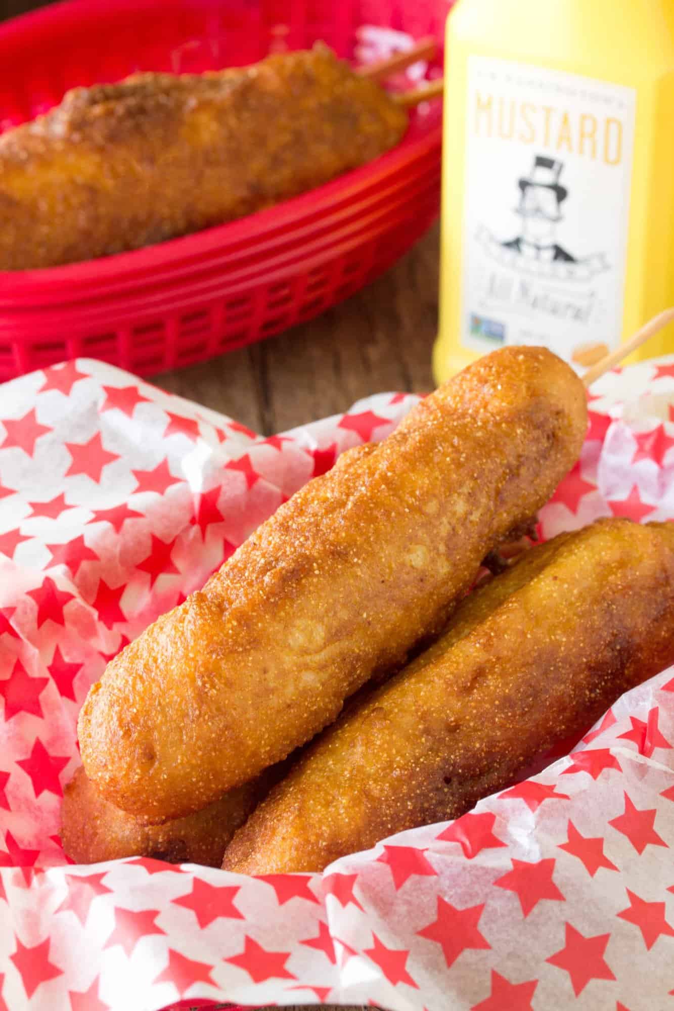 These Disneyland-Style Hand Dipped Corn Dogs are covered with a thick cornbread coating and fried to golden brown perfection. It’s just like they make them on Main Street at Disneyland’s Little Red Wagon.