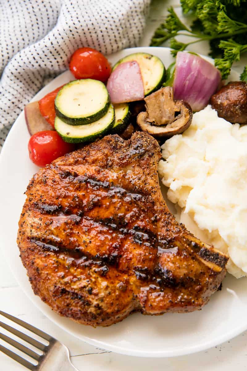 Grill Pork Chop served with mashed potatoes and grilled vegetables