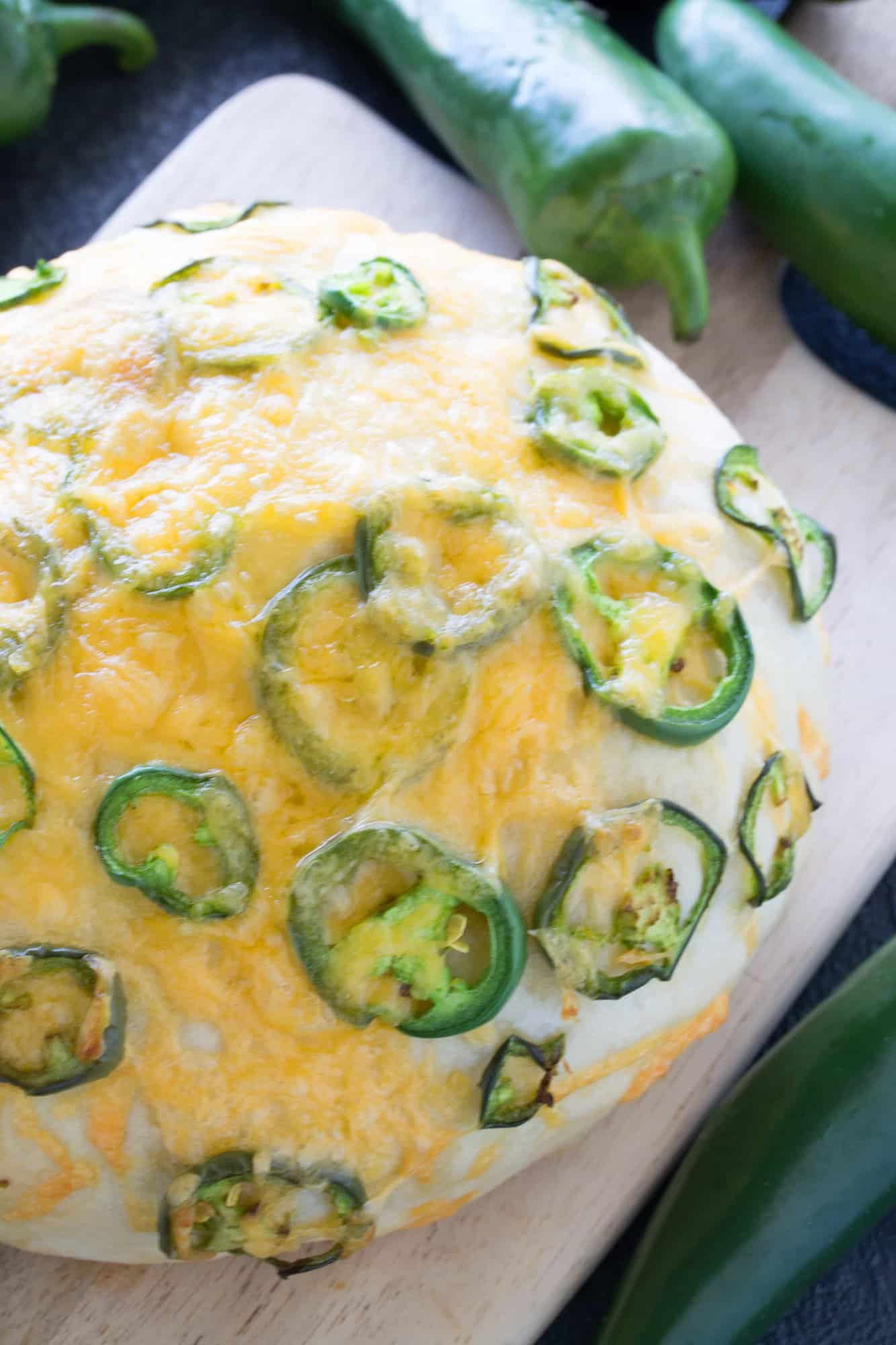 Close up of Jalapeno Cheese Bread on a cutting board.