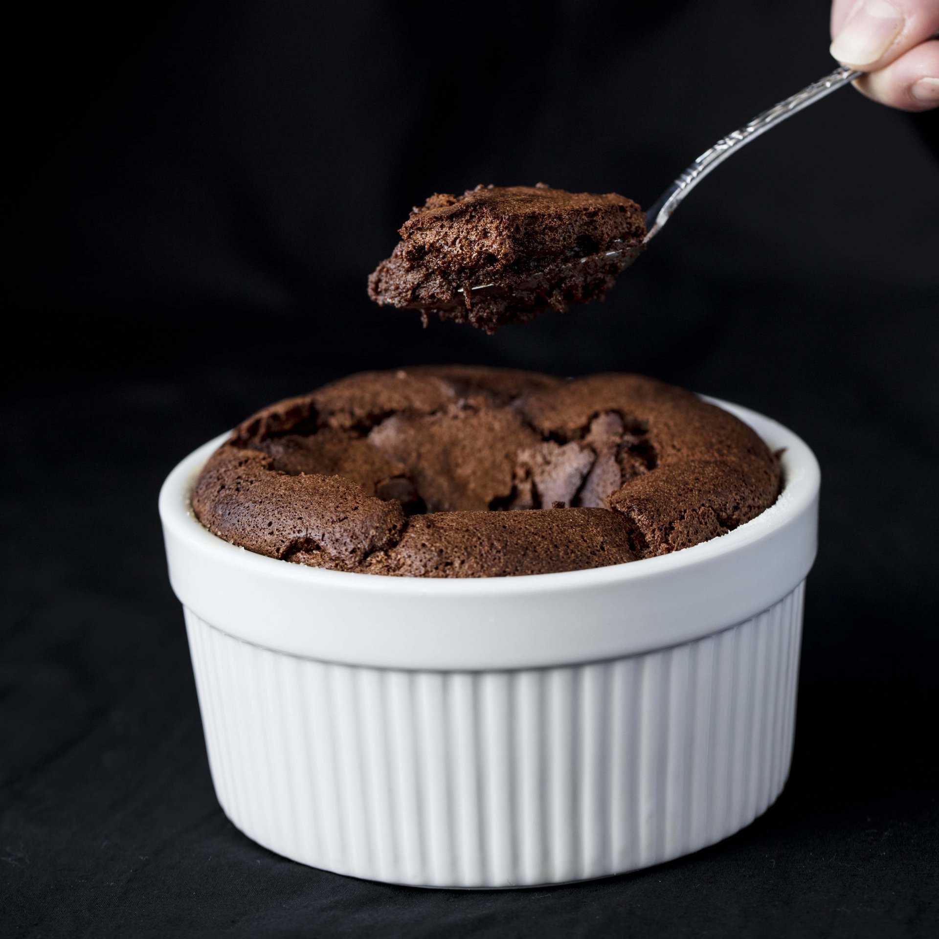 This Easy Chocolate Soufflé will make any chocolate lover swoon! Making soufflés doesn't have to be impossibly hard. You just need a good set of instructions!