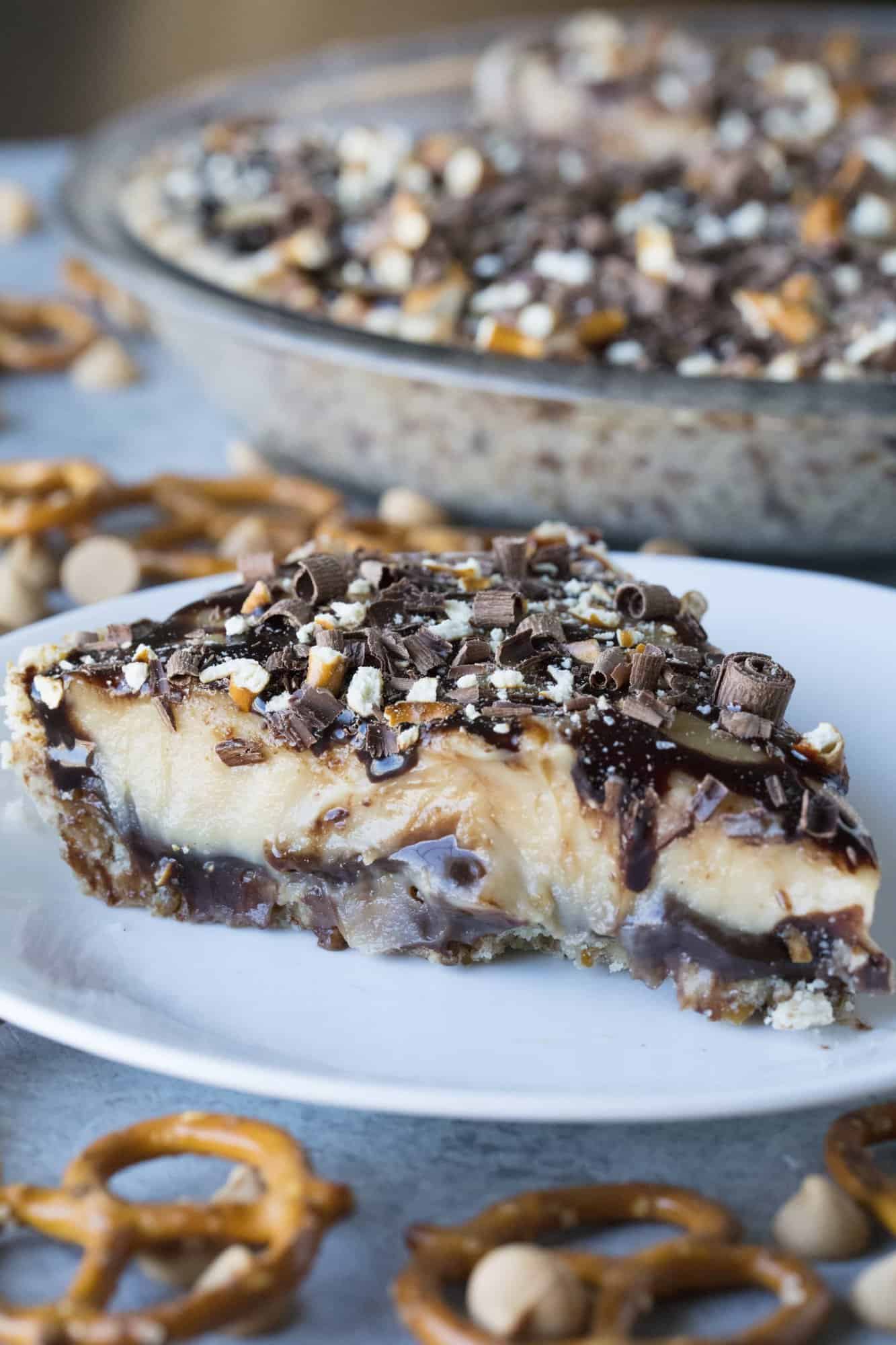 Get ready for a pie that will change your life! Peanut Butter Hot Fudge Pie with Pretzel Crust is sure to be a family favorite!