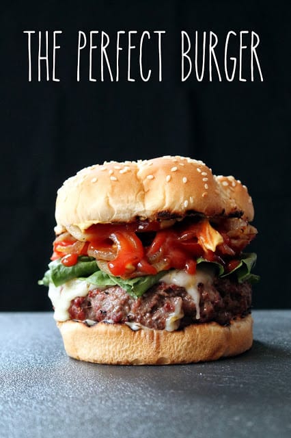 The perfect burger sitting on a counter top.