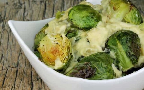 Dijon Garlic Brussel Sprouts in a white bowl.