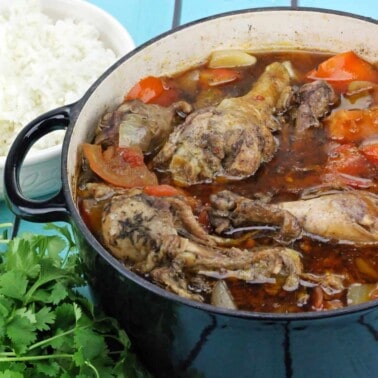 Caribbean Chicken in a blue cooking pot.