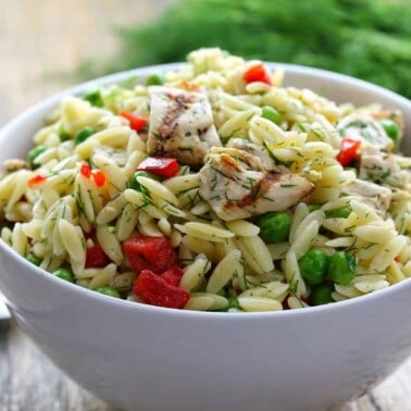 Lemon-Dill Chicken and Orzo Pasta Salad in a white bowl.