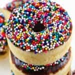 Baked vanilla cake donuts topped with a semi-sweet chocolate glaze and sprinkles. You can't go wrong with sprinkles!