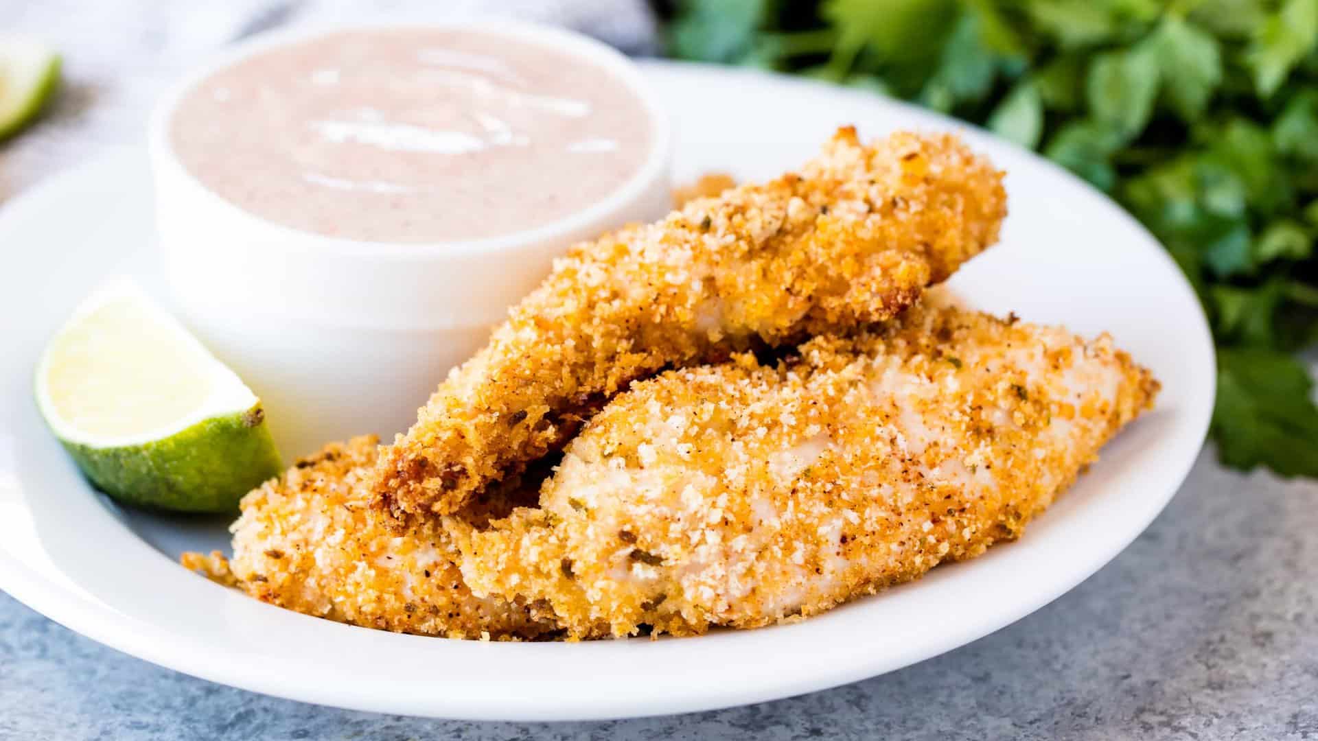 Chili-Lime Baked Chicken Tenders take the classic flavor combination and mashes it with a kid favorite, for a grown up version of chicken tenders that will have you licking your fingers! This easy dinner will be a hit with the whole family!