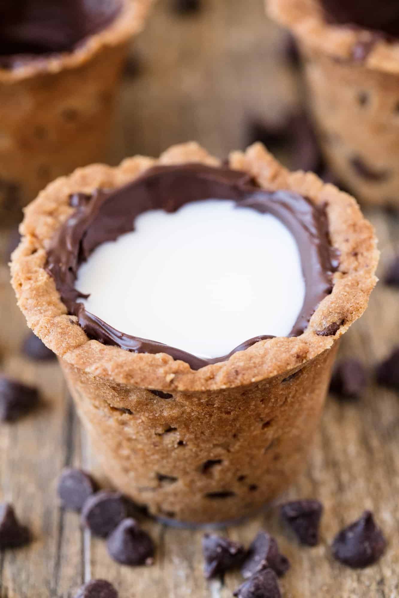 Drink your milk and cookies straight from a Chocolate Chip Cookie Shot glass! This fun dessert makes for a great party food. So much fun!
