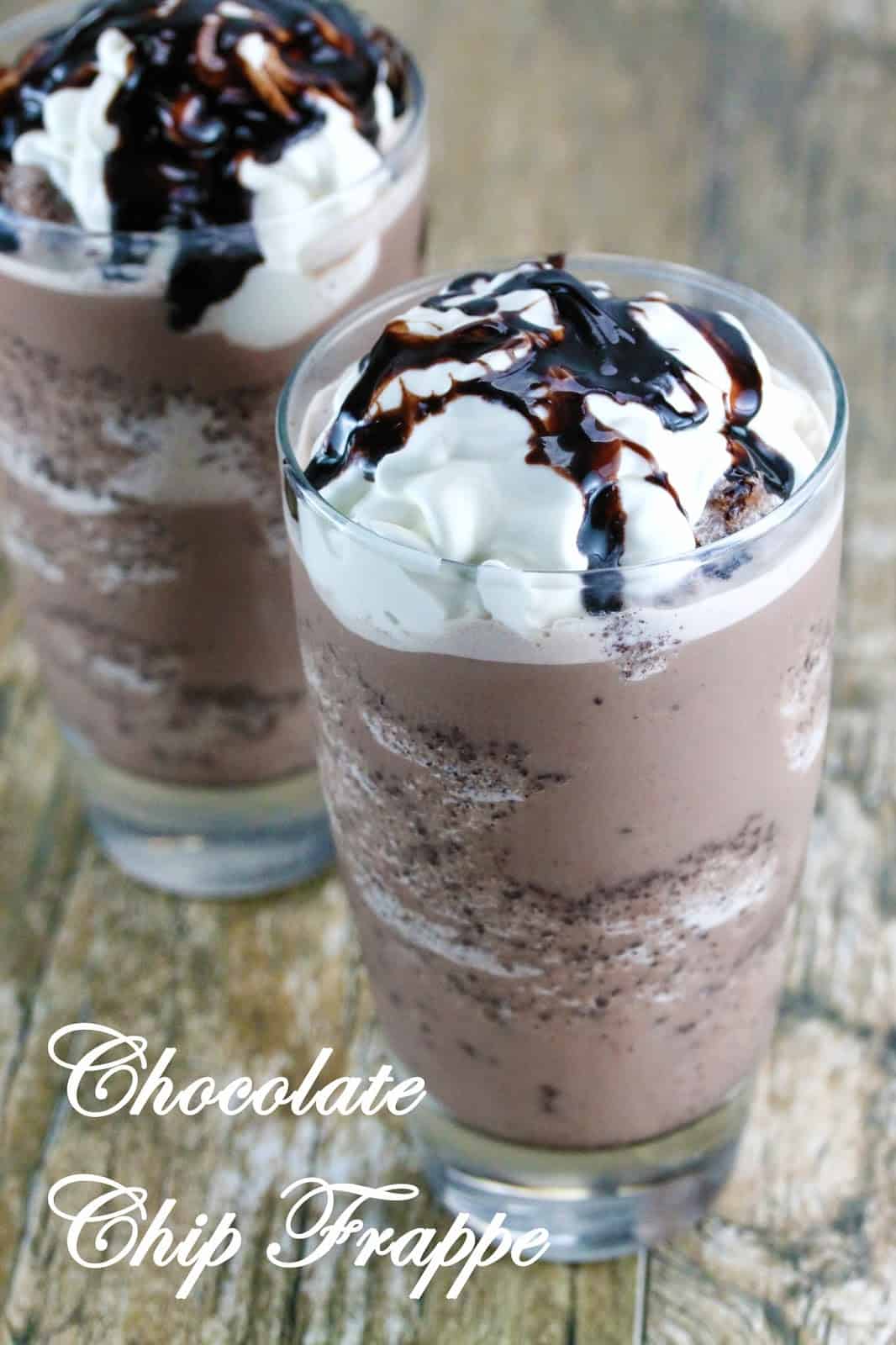 Two Homemade Chocolate Chip Frappes on a wood countertop.