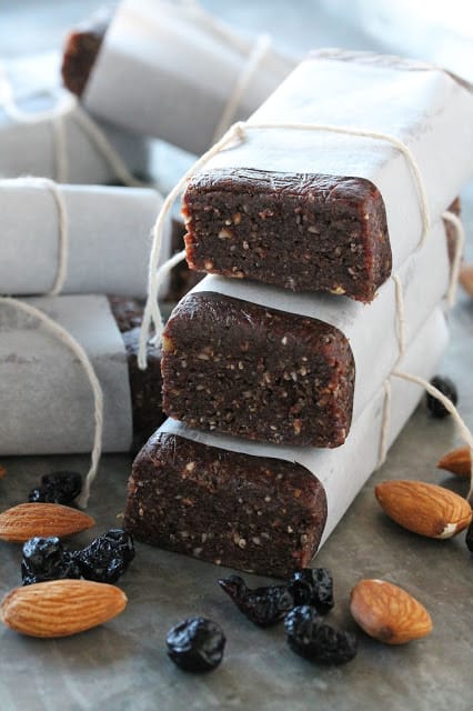Superfood Protein Energy Bars wrapped in parchment paper and tied with string.