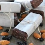 Superfood Protein Energy Bars wrapped in parchment paper and tied with string. These bars are packed with 7 different superfoods!