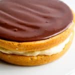  Two layers of yellow cake are filled with pastry cream and topped off with a chocolate gl The Most Amazing Boston Cream Pie