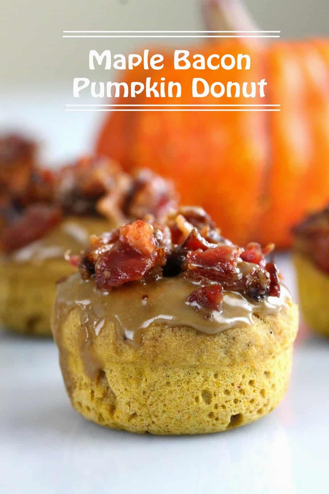 Maple bacon pumpkin donut with the text "Maple Bacon Pumpkin Donut" above it.