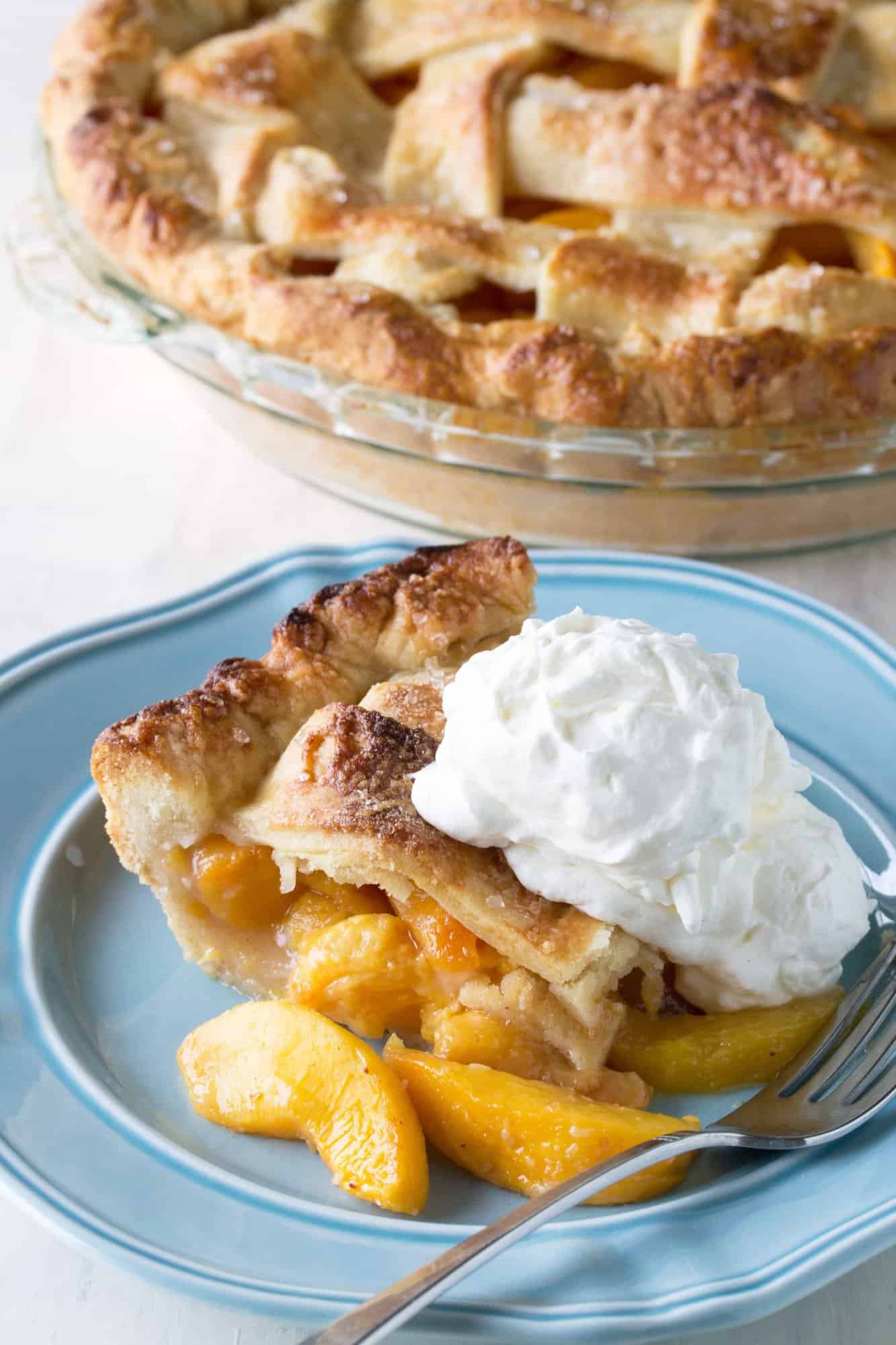 The perfect peach pie is within your grasp. A vibrant, sweet peach filling surrounded by a perfect fail-proof crust. It's all about the secret ingredient.