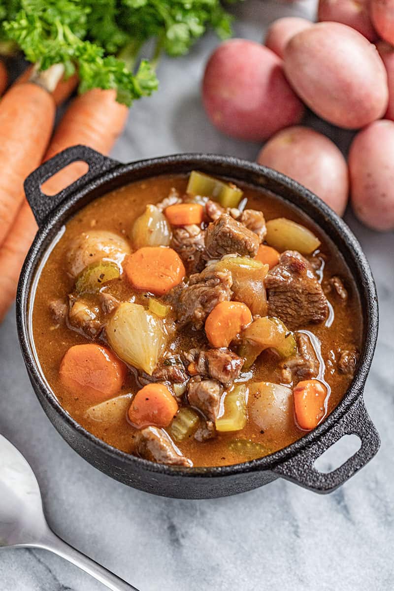 Beef Stew in a black bowl.