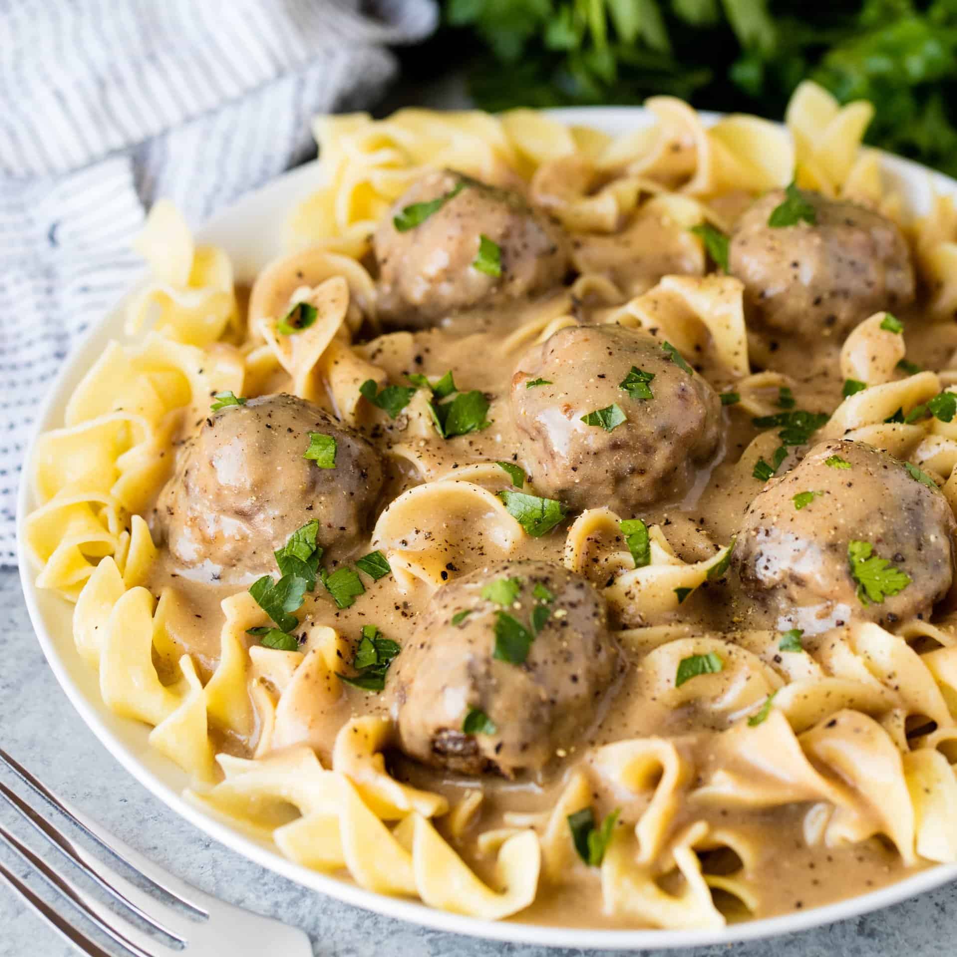The Best Swedish Meatballs and Gravy are made with a combination of ground pork and beef and spiced to perfection for a flavorful meatball and with a rich and flavorful gravy to go with it!