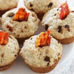 Bacon Nutella Muffins served on a tray and garnished with slices of crispy bacon