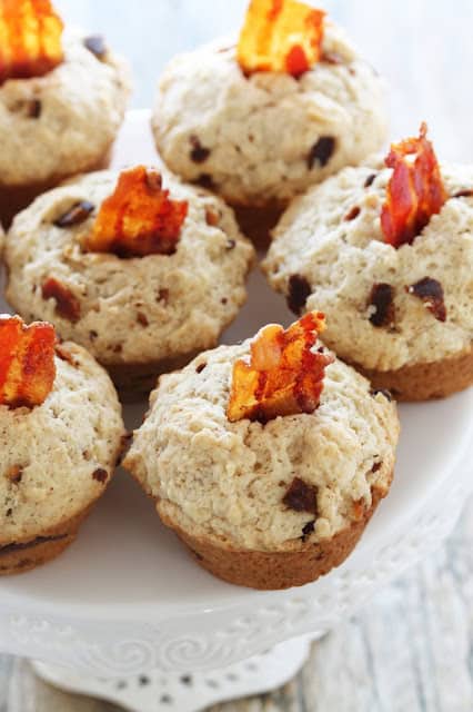 Bacon Nutella Muffins served on a tray and garnished with slices of crispy bacon