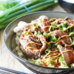 Rice noodles, rice, and cabbage, topped with delicious Korean bulgogi, drizzled with sriracha mayo and Korean barbecue sauce....it's seriously so good!