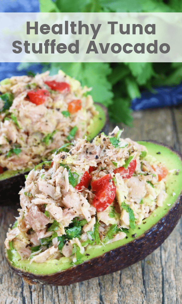 This Healthy Tuna Stuffed Avocado is stuffed with a flavorful southwest mixture of tuna, bell pepper, jalapeno, and cilantro. No mayo necessary here! It's the perfect healthy lunch. 
