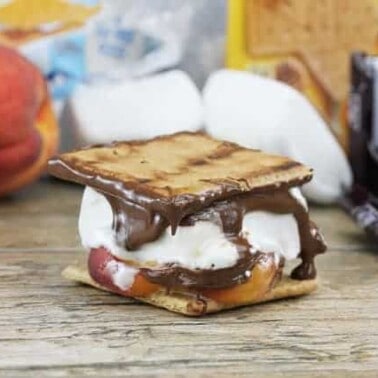 Grilled Peach Smores on a tabletop.