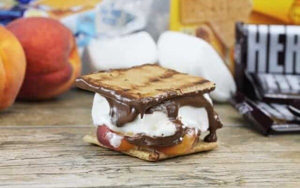 Grilled Peach Smores on a tabletop.