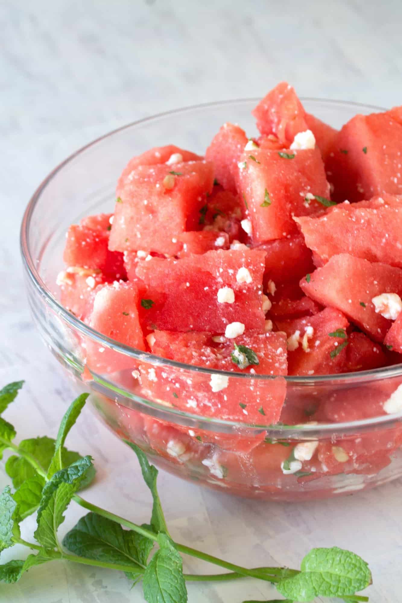 Serve simple summer watermelon up gourmet style with this Watermelon Feta Salad with Mint  Watermelon Feta Salad with Mint and Lemon