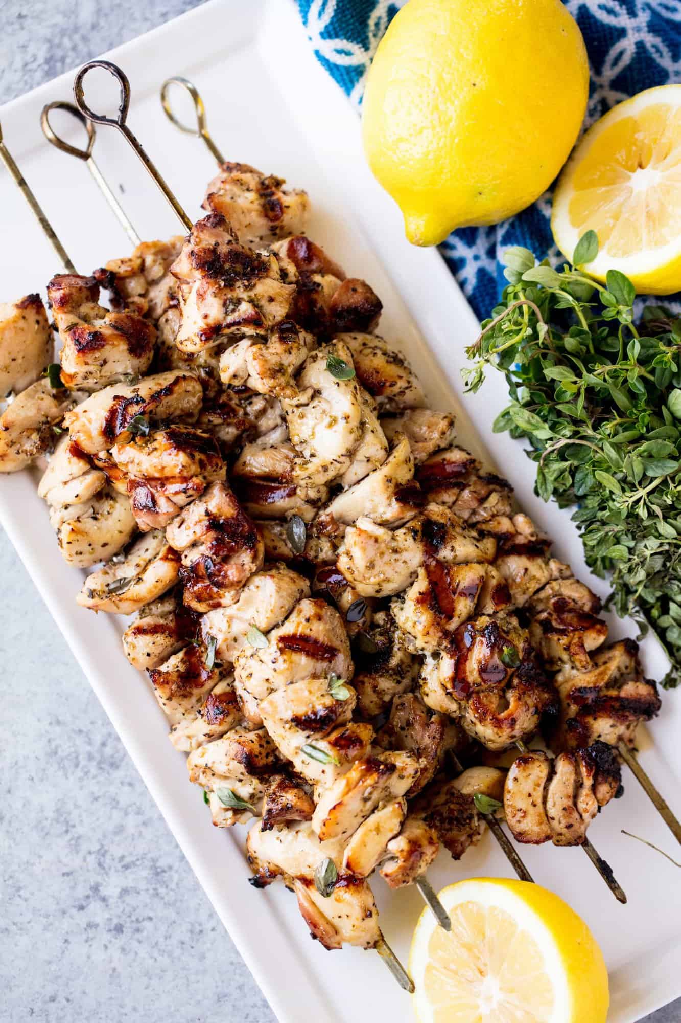 Grilled Lemon and Herb Chicken Thigh Skewers are moist and flavorful and super easy to make. People are always blown away by how much delicious flavor these skewers pack in!
