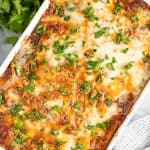 Bird's eye view of Chicken Enchilada Casserole in a cooking dish.