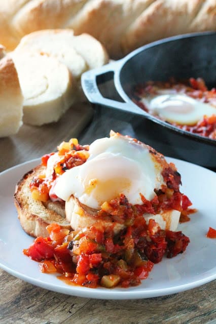 Pisto is a dish from Spain that is flavorful and full of vegetables, served over toasted bread and topped off with a fried egg.