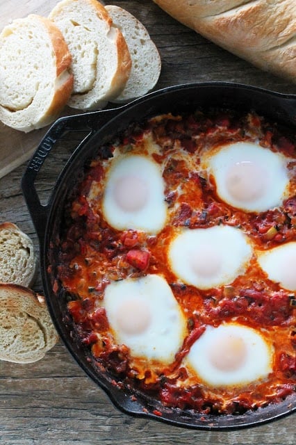 Spanish pisto with eggs, cooked in the skillet and ready to add to some fresh toasted bread