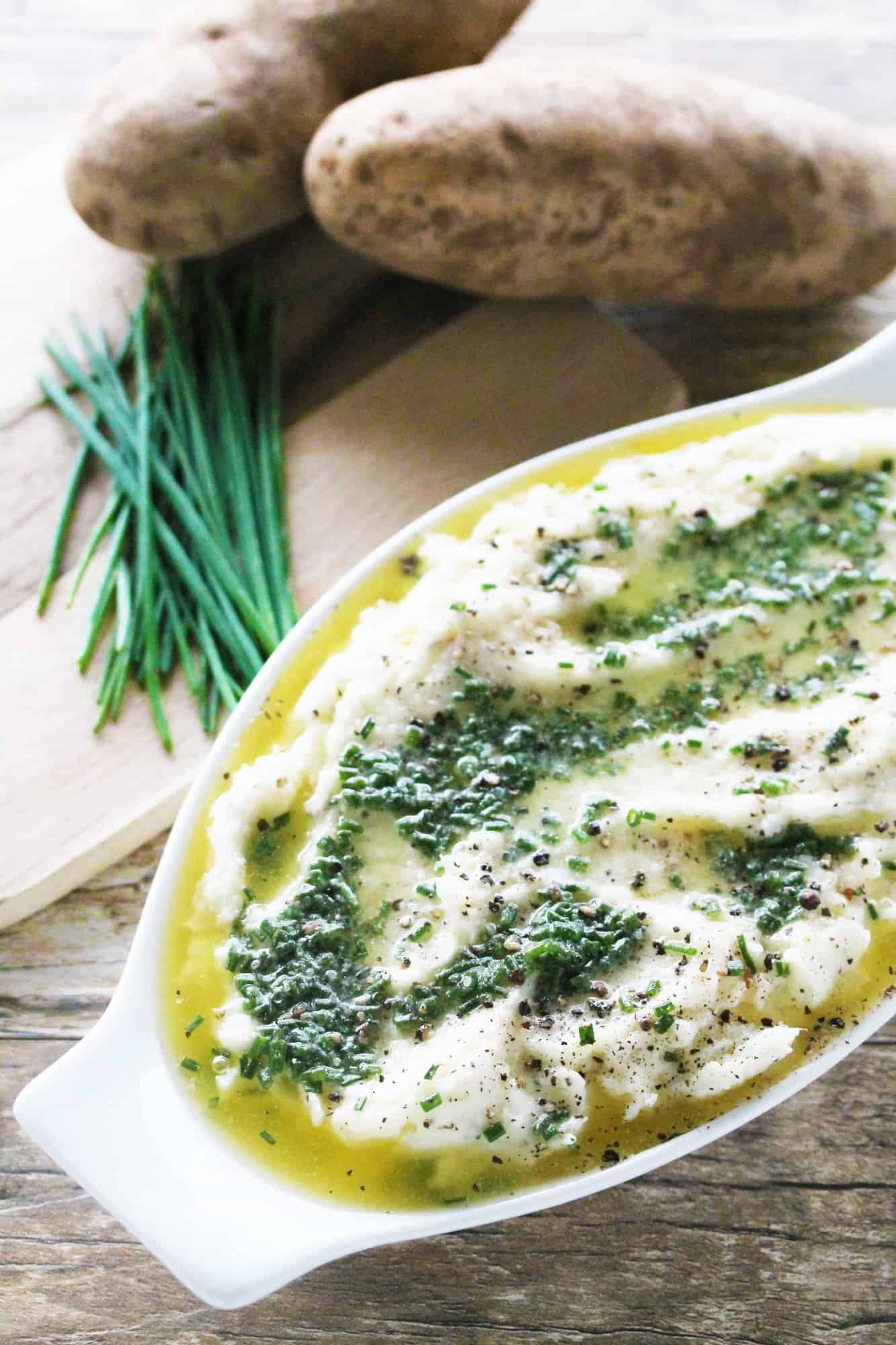 Creamy herbed butter mashed potatoes are packed with flavor and dripping with buttery decadence.