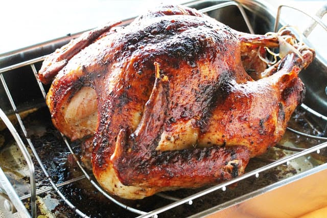 A roasted turkey fresh from the oven. Juicy, seasoned and tender.