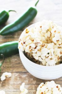 All the flavors of jalapeño poppers wrapped up in a fun and tasty popcorn ball. This is a funky, fun, flavorful treat and a great twist on your standard popcorn ball.