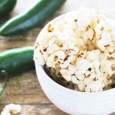 All the flavors of jalapeño poppers wrapped up in a fun and tasty popcorn ball. This is a funky, fun, flavorful treat and a great twist on your standard popcorn ball.