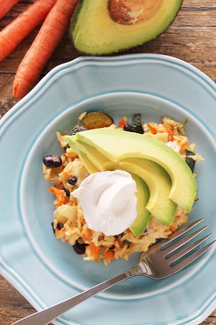 Mexican spices and several vegetables are mixed with brown rice in this healthy Mexican Brown Rice and Black Bean Casserole