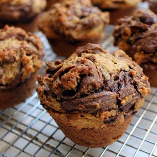 A soft and moist peanut butter muffin with swirls of Nutella. Peanut Butter Nutella Muffins are what muffin heaven looks like!
